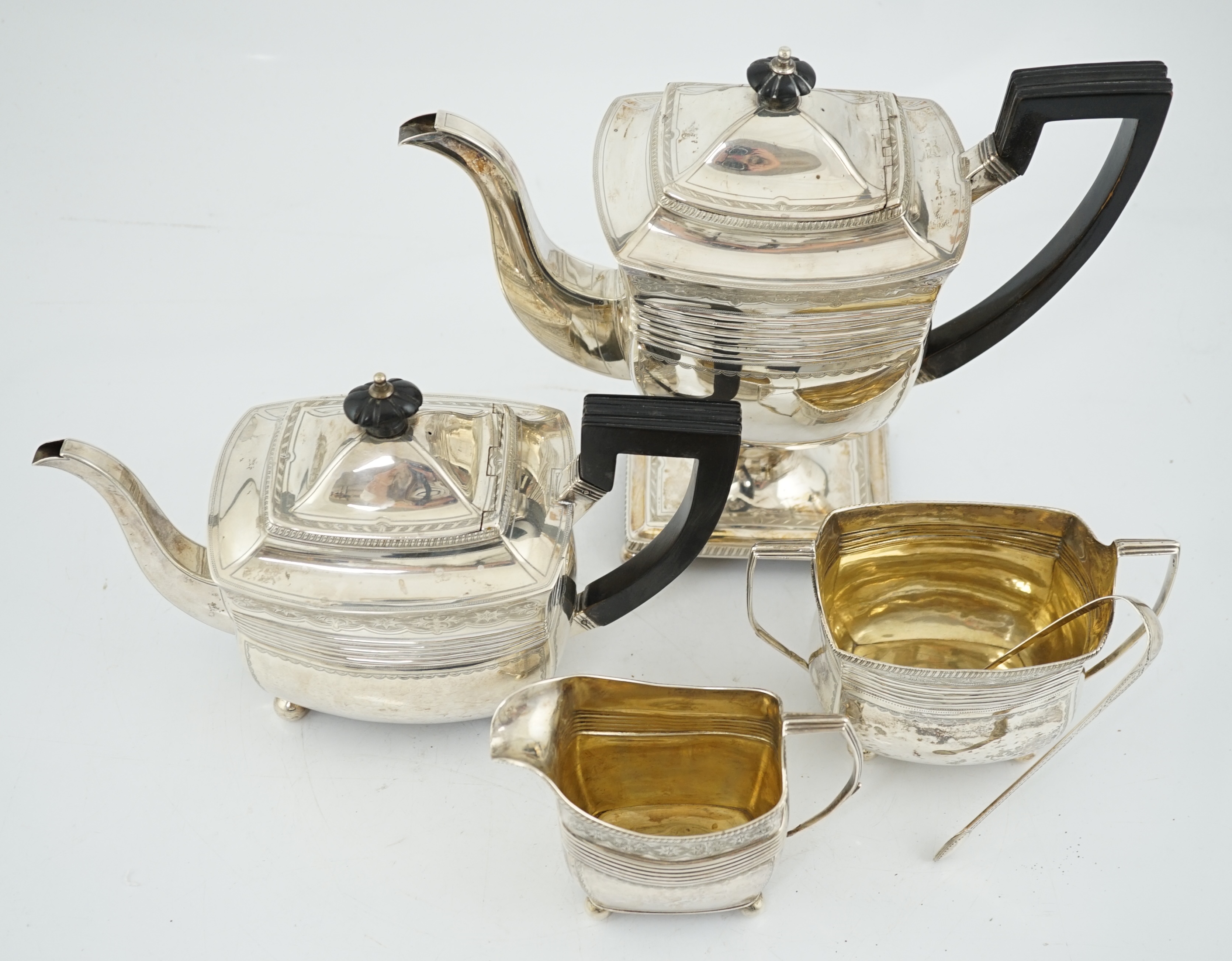 A George III engraved silver four piece tea and coffee service, by Peter & William Bateman